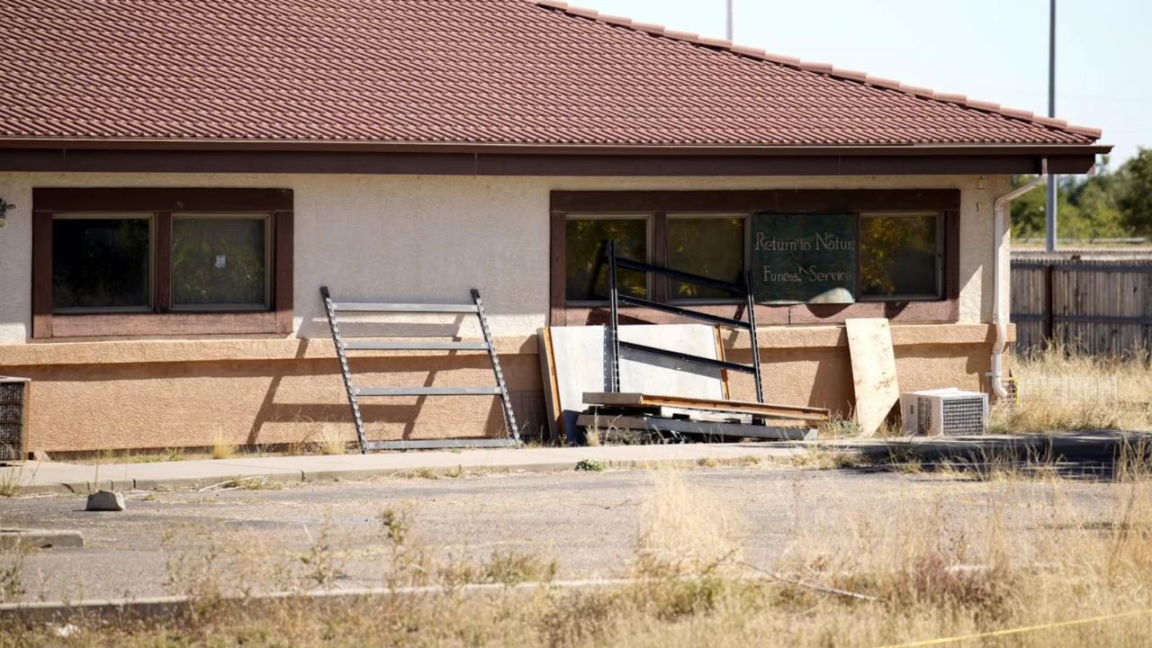 Funeral-home owner to plead guilty after stashing 190 bodies