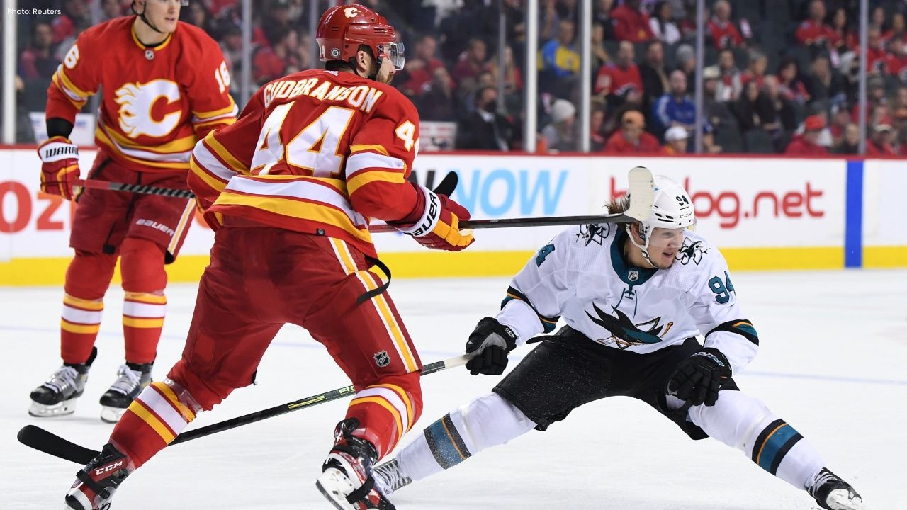 Flames Ignite Late Burst to Overwhelm Sabres
