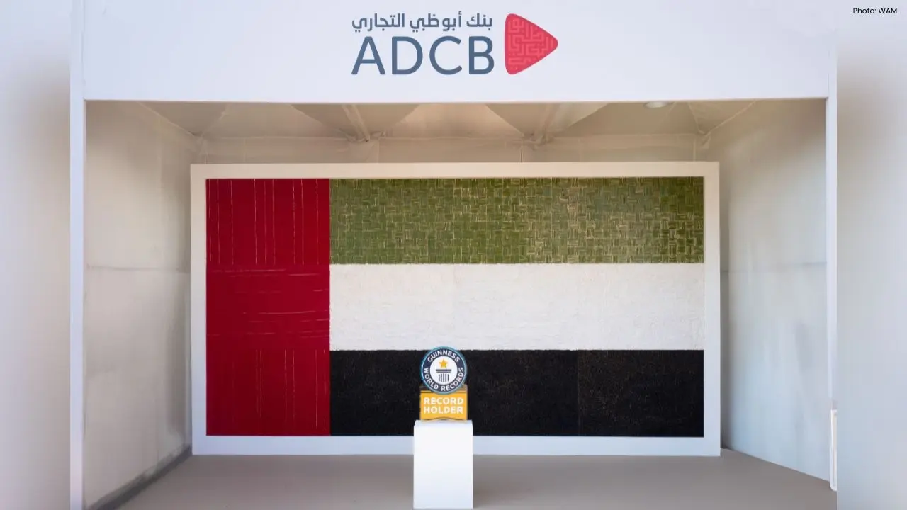 ADCB Unveils World’s Largest Biodegradable UAE Flag for Union Day
