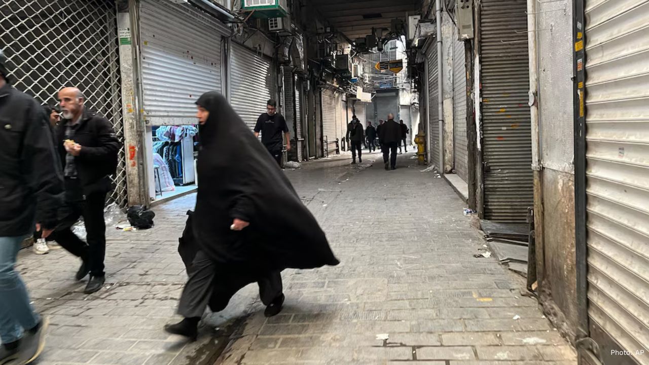 Iranians on Edge Amidst Protests and U.S. Venezuela Action