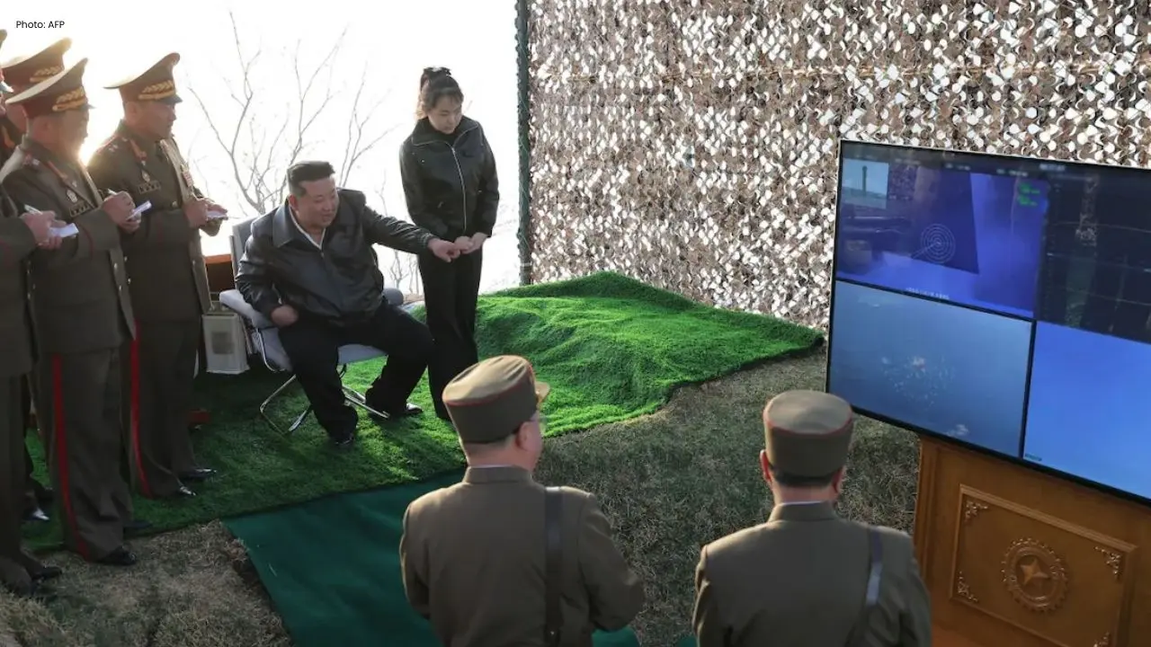 Kim Jong Un Conducts Missile Tests with Daughter by His Side